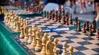 Štiavnický živý šach 2026: Simultánna partia s GM Movsesianom a GM Gledurom